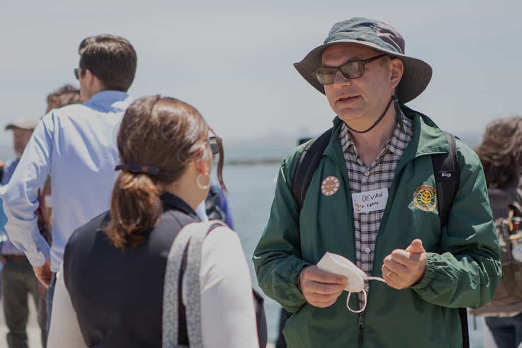 Two people discussing conservation issues